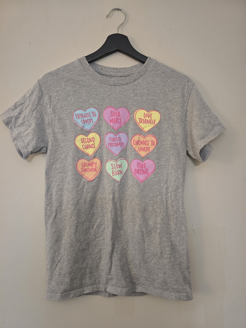 Womens Graphic T-Shirt Featuring Romance Novel Conversation Heart Design